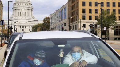 Trump faces virus spike in Midwest